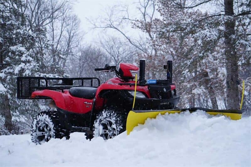Country blade working in snow